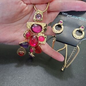 Gold tone long rhinestone necklace with earrings